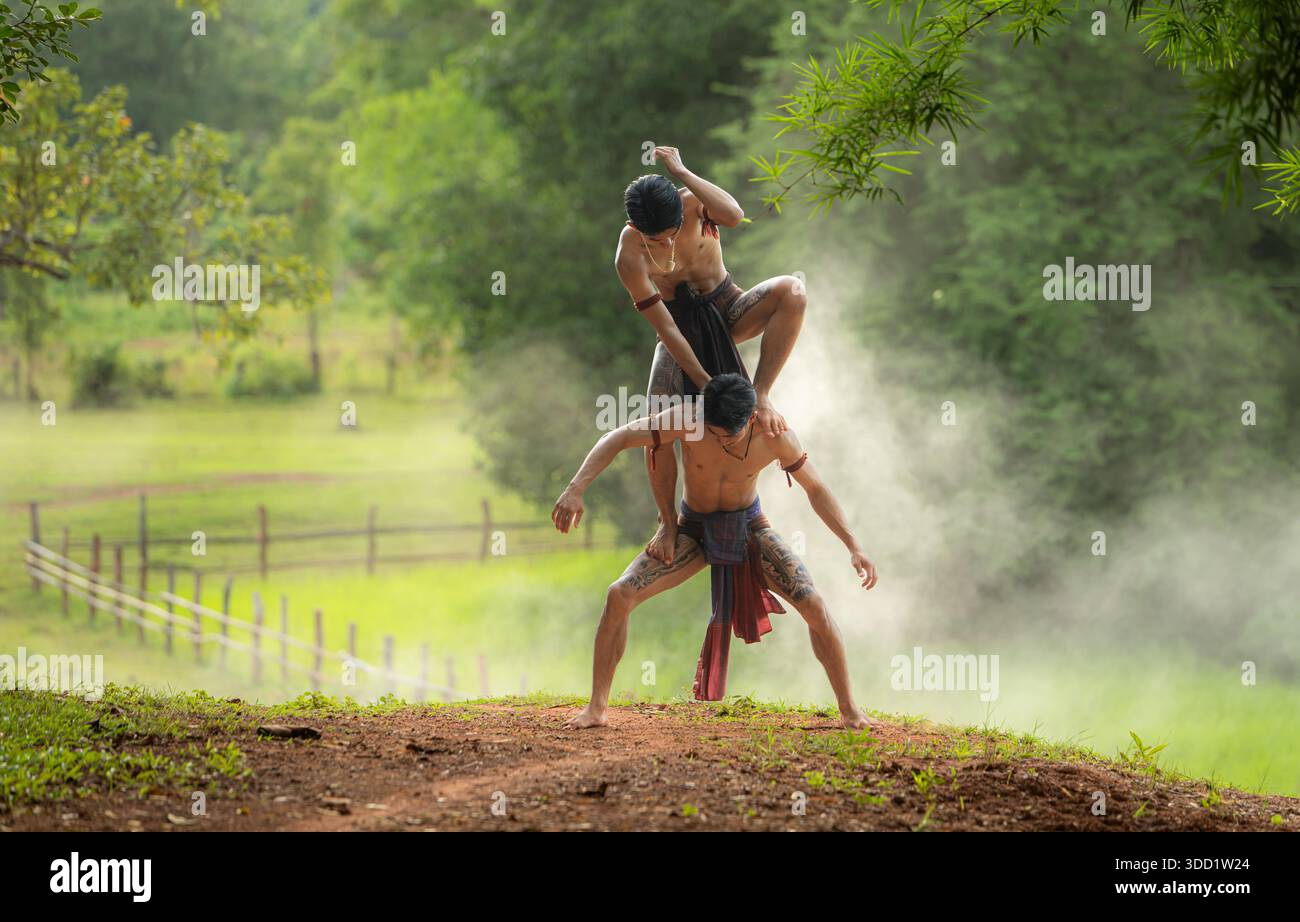 A farmer and a rice worship ritual with a group of traditional dancers ...