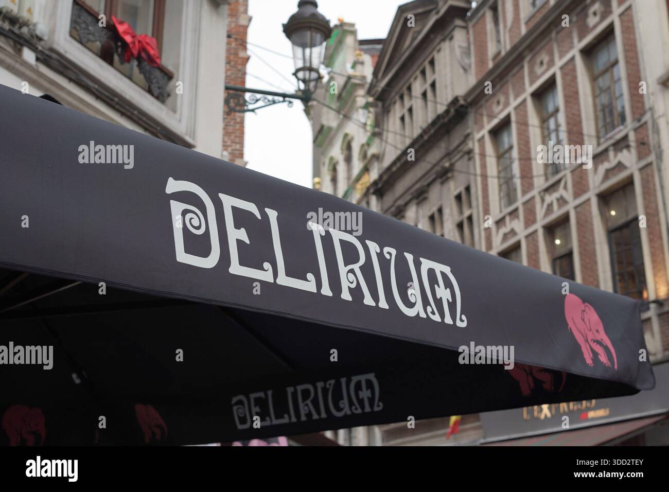 Belgium Beer brand Delirium advertised on a bar umbrella in Brussels, Belgium Stock Photo