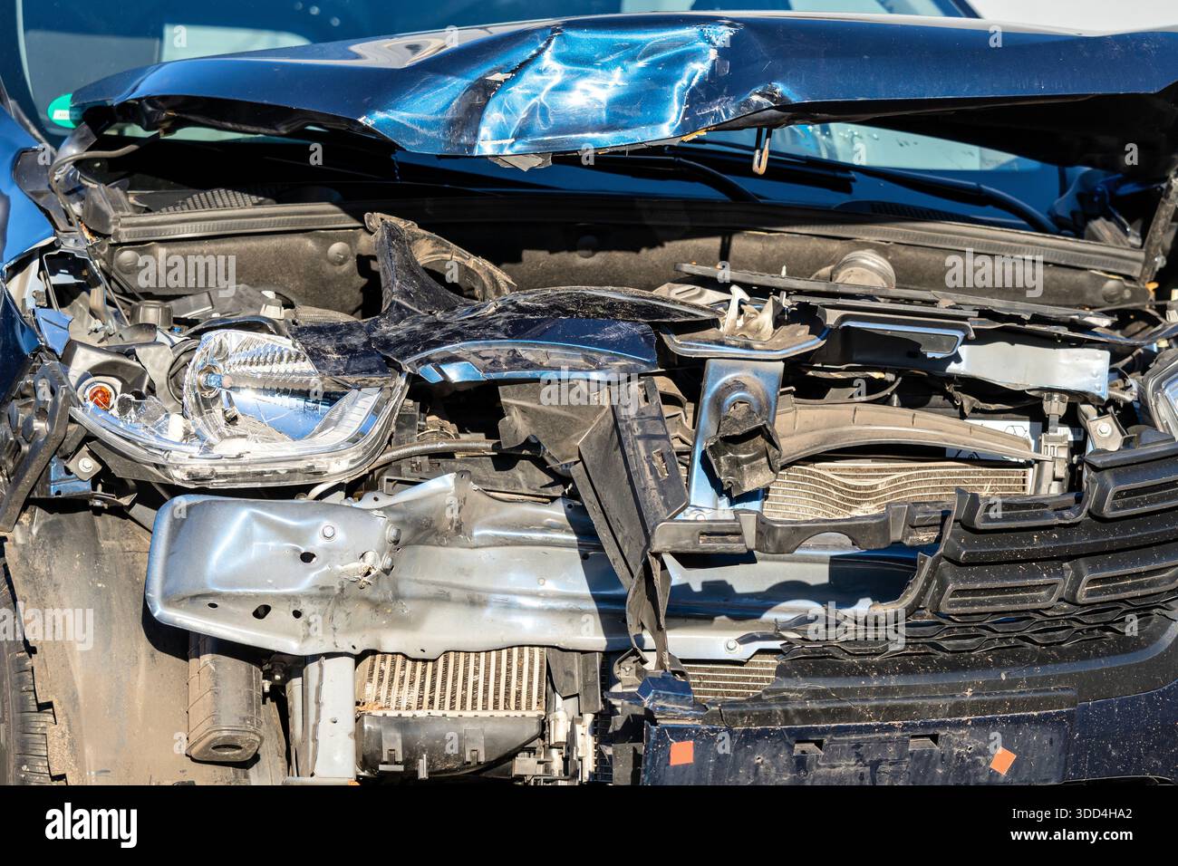 Wrecked Def wrecked car with front damage Stock Photo - Alamy