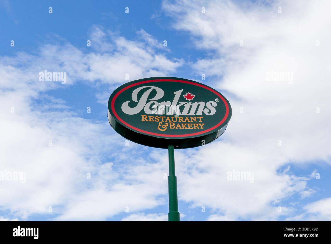 Close up of Perkins sign with blue sky in background. Stock Photo