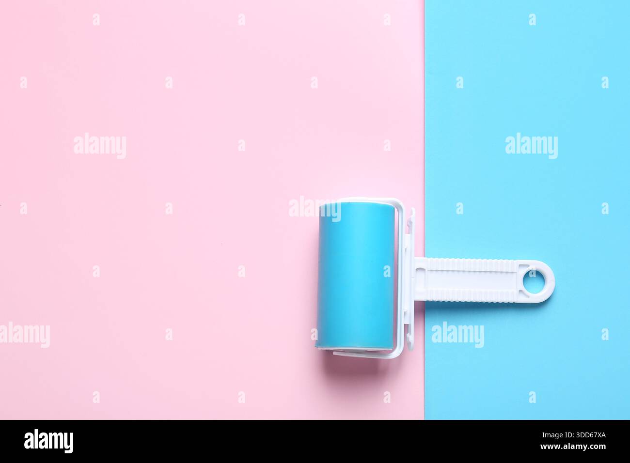 Lint roller on color background Stock Photo
