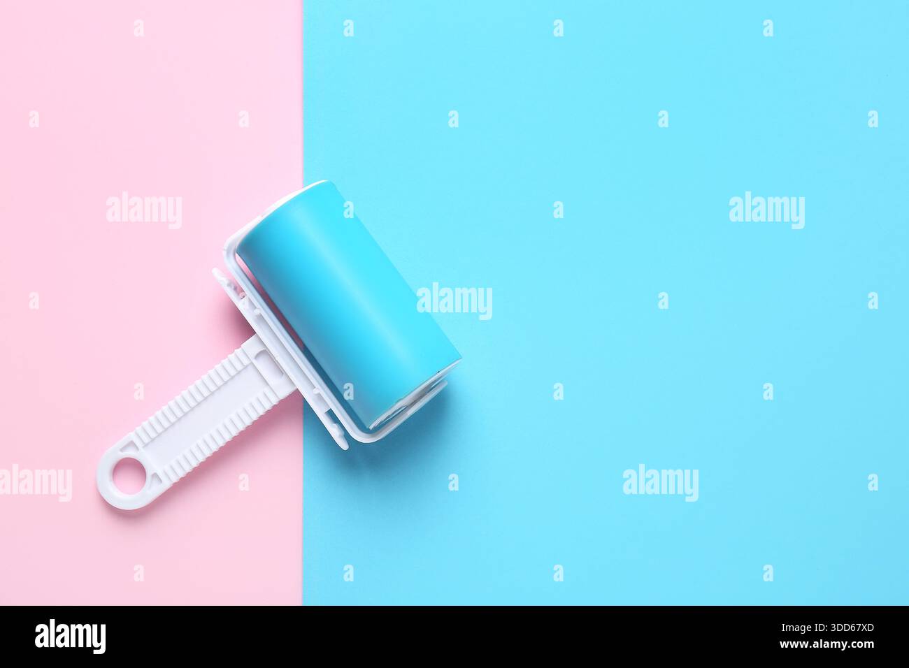 Lint roller on color background Stock Photo