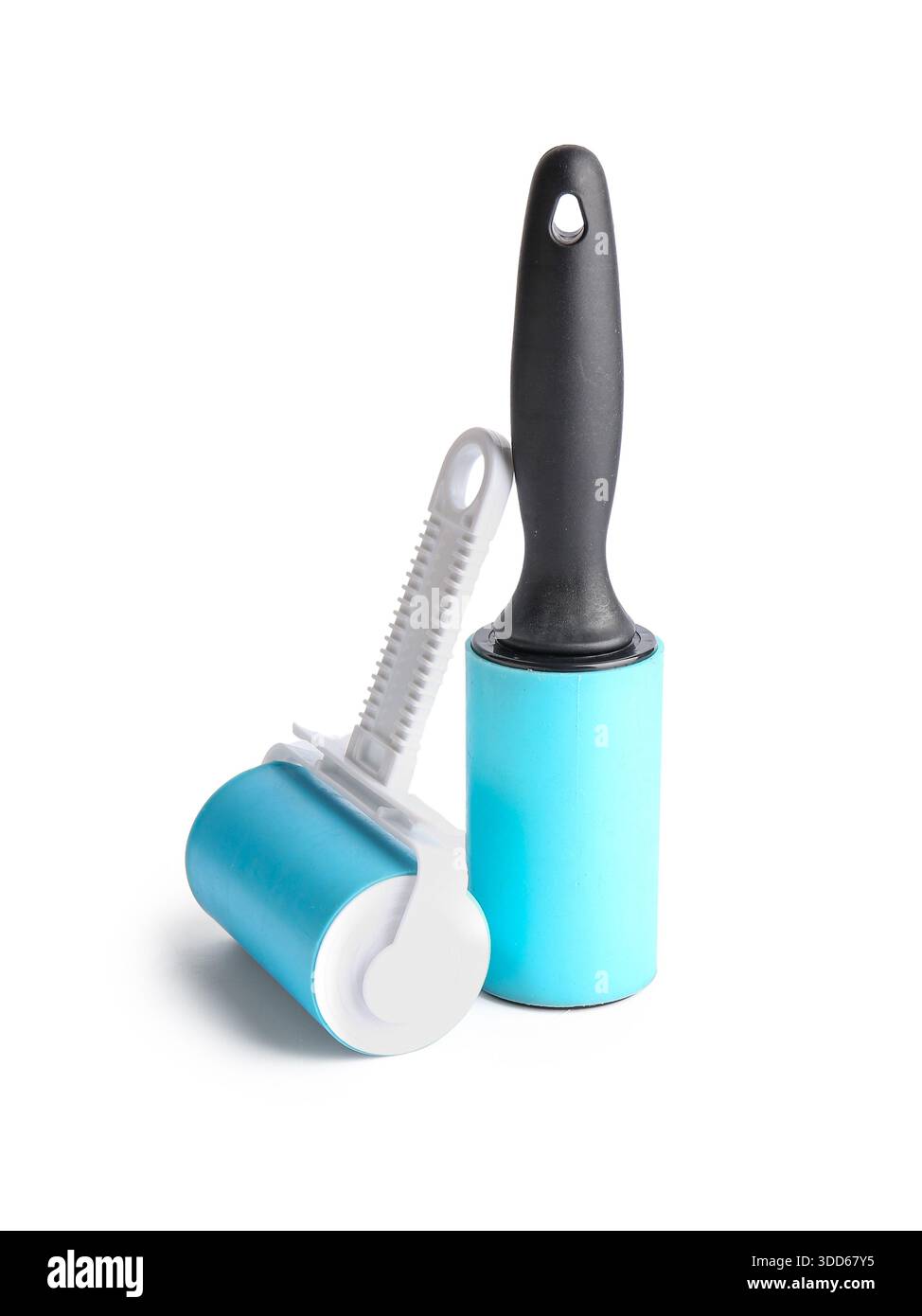 Different lint rollers on white background Stock Photo
