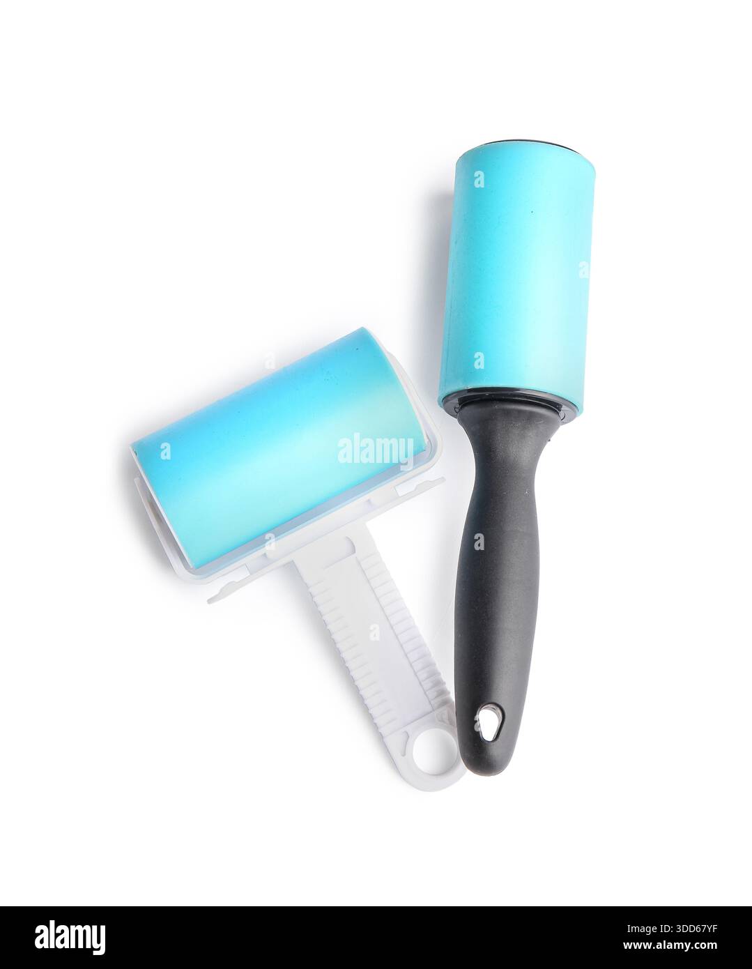 Different lint rollers on white background Stock Photo