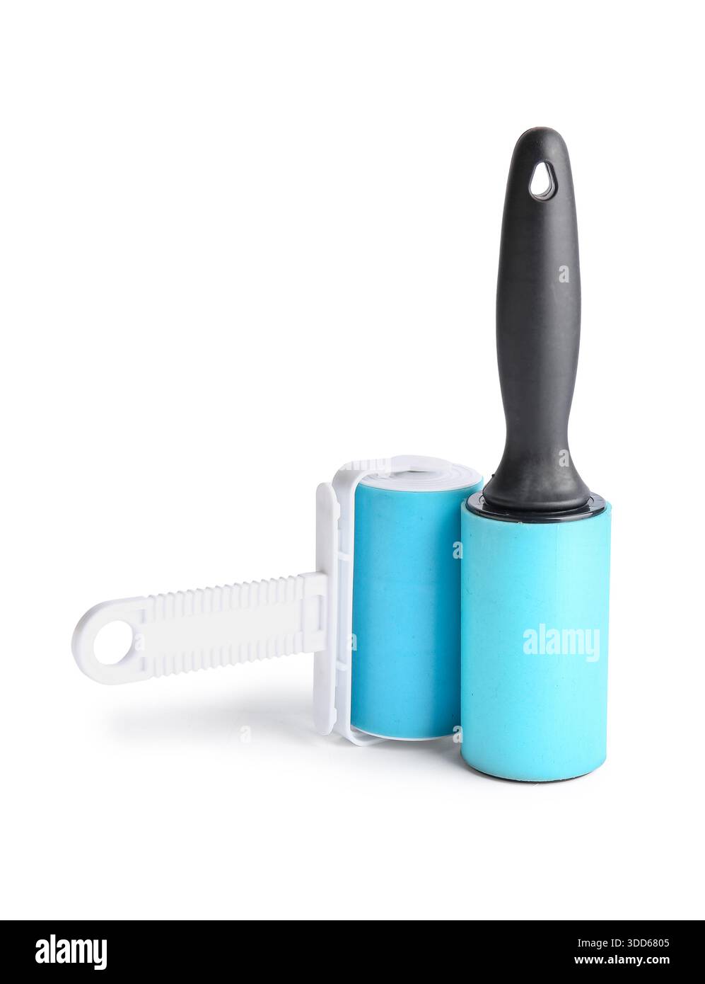 Different lint rollers on white background Stock Photo
