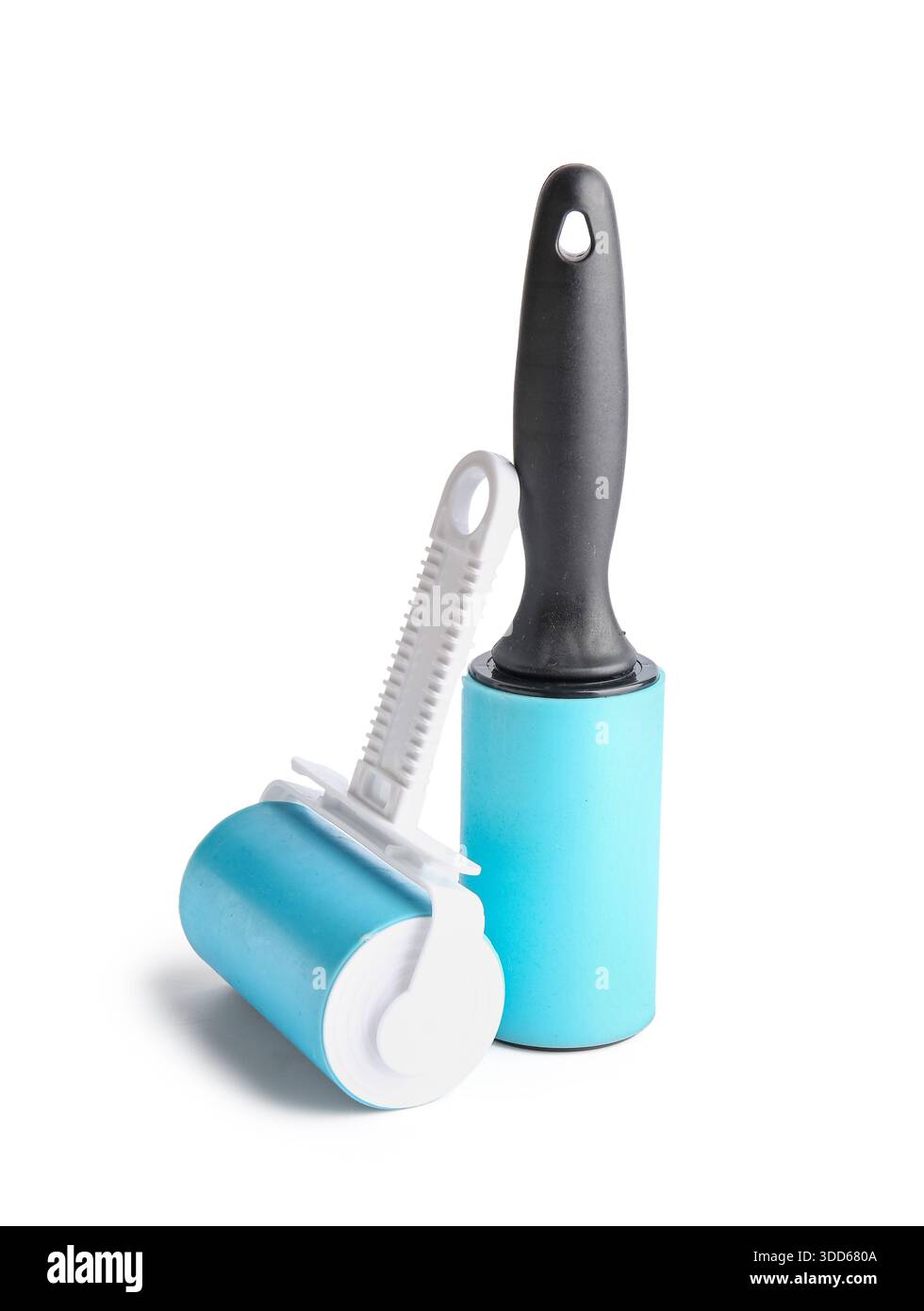 Different lint rollers on white background Stock Photo
