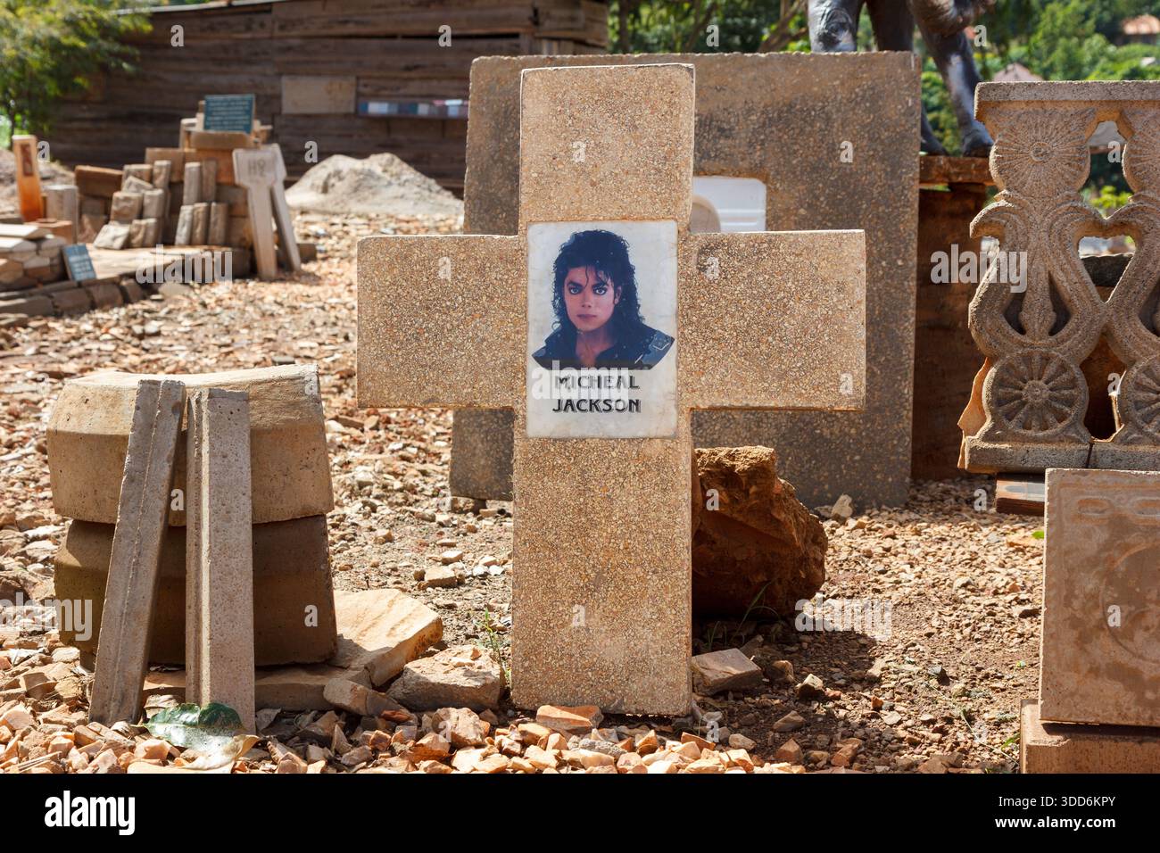 A gravestone with the picture fo Michael Jackson in a monumental masonry shop in rural Uganda. - Stock Image
