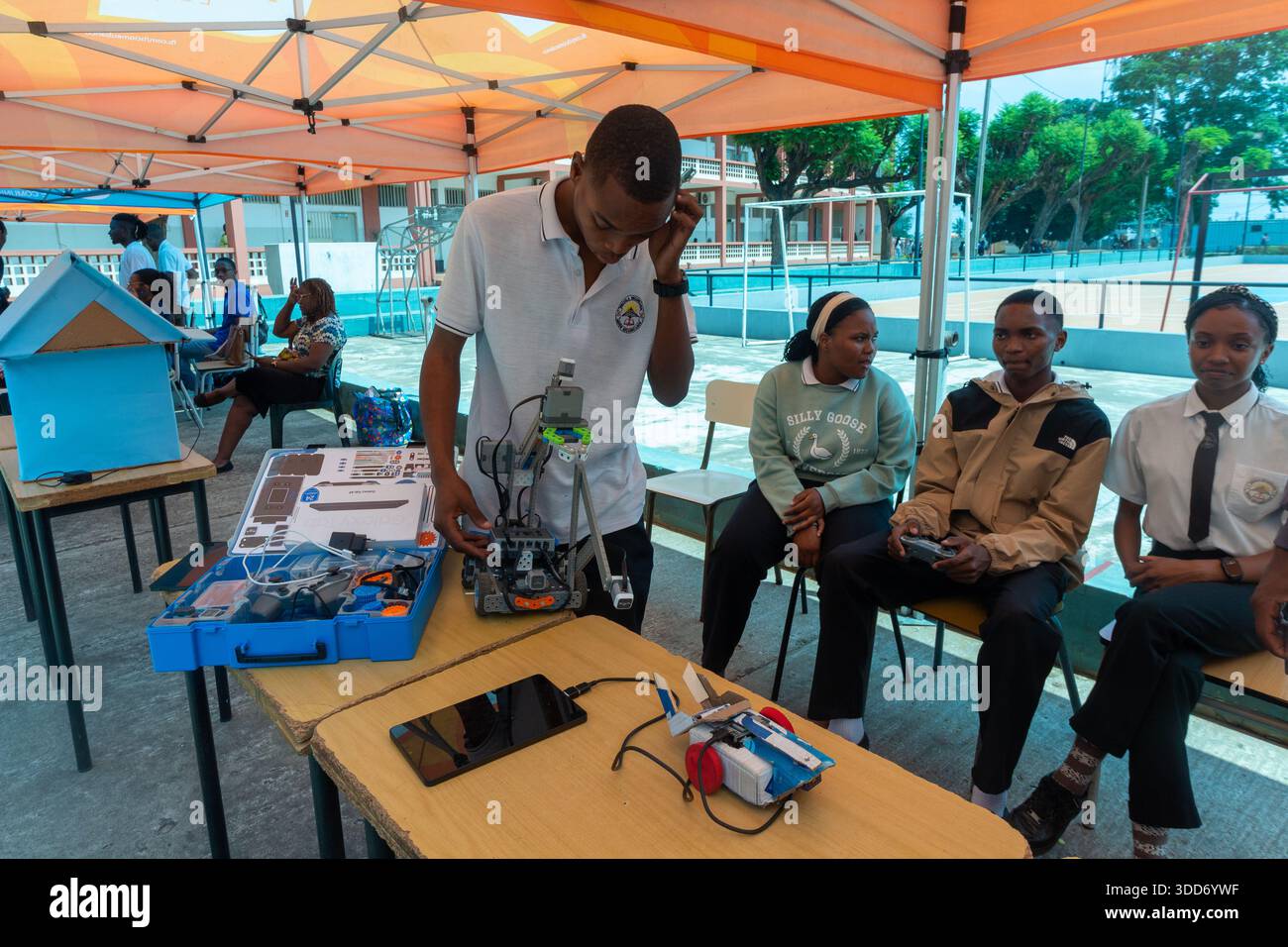 Students assemble and test an educational robot using electronic parts Stock Photo
