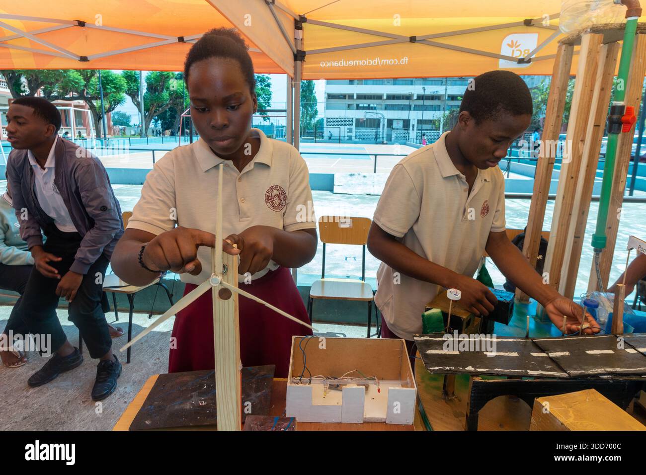 Windmill Student Cod A group of students works on a windmill prototype to demonstrate wind ...