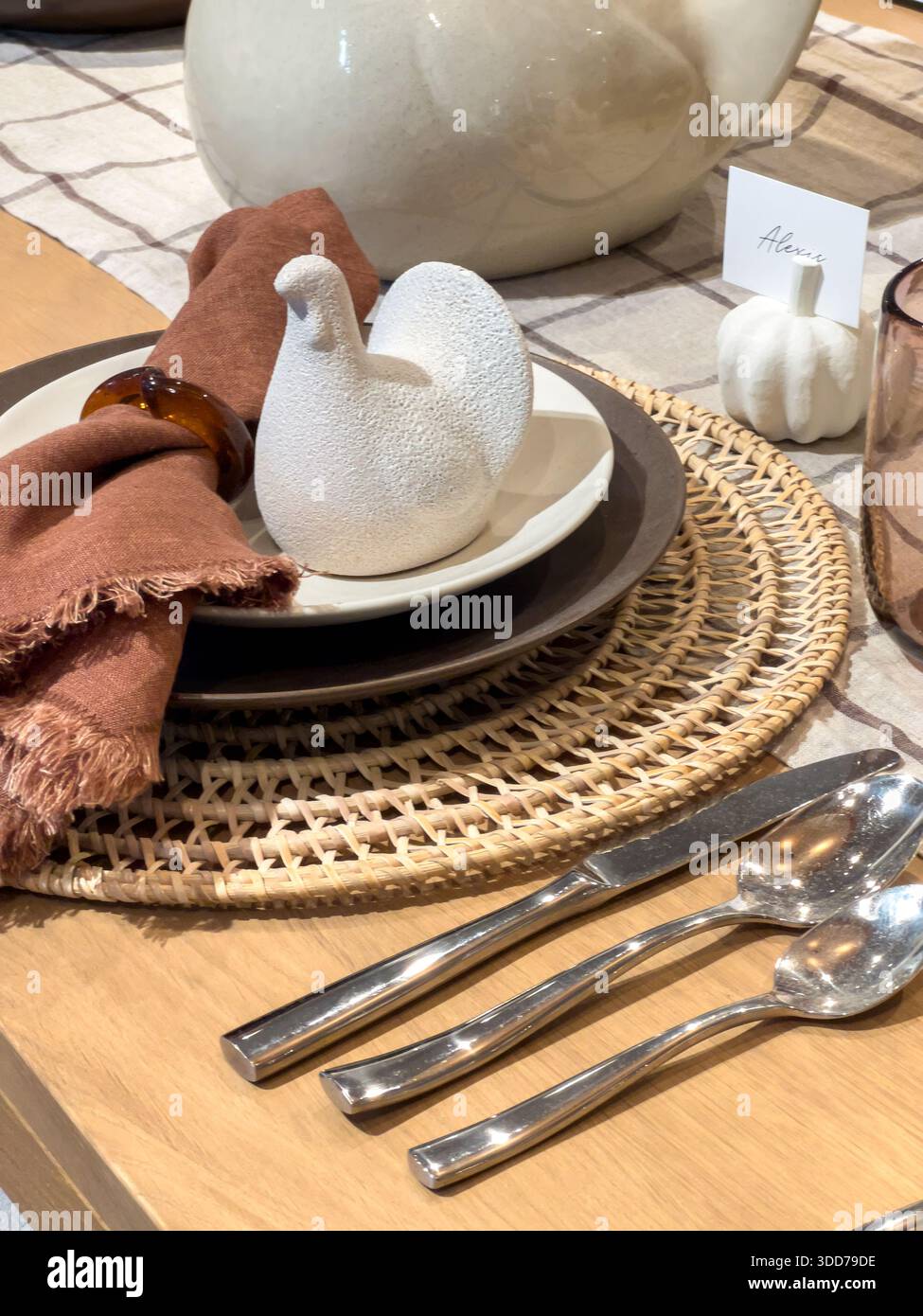 Modern Fall Table Setting with Brown Napkin Stock Photo
