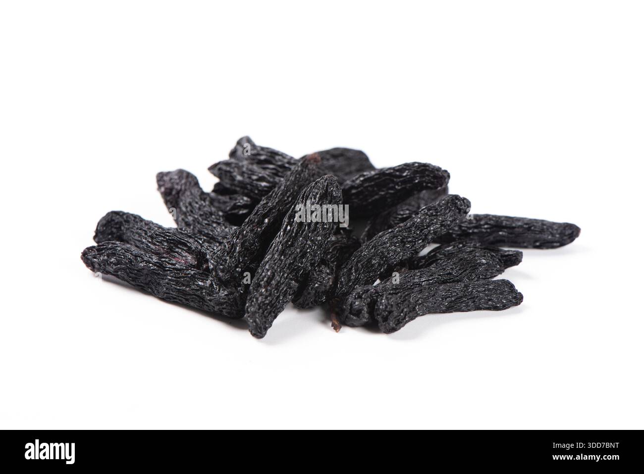 black raisins isolated on white background Stock Photo
