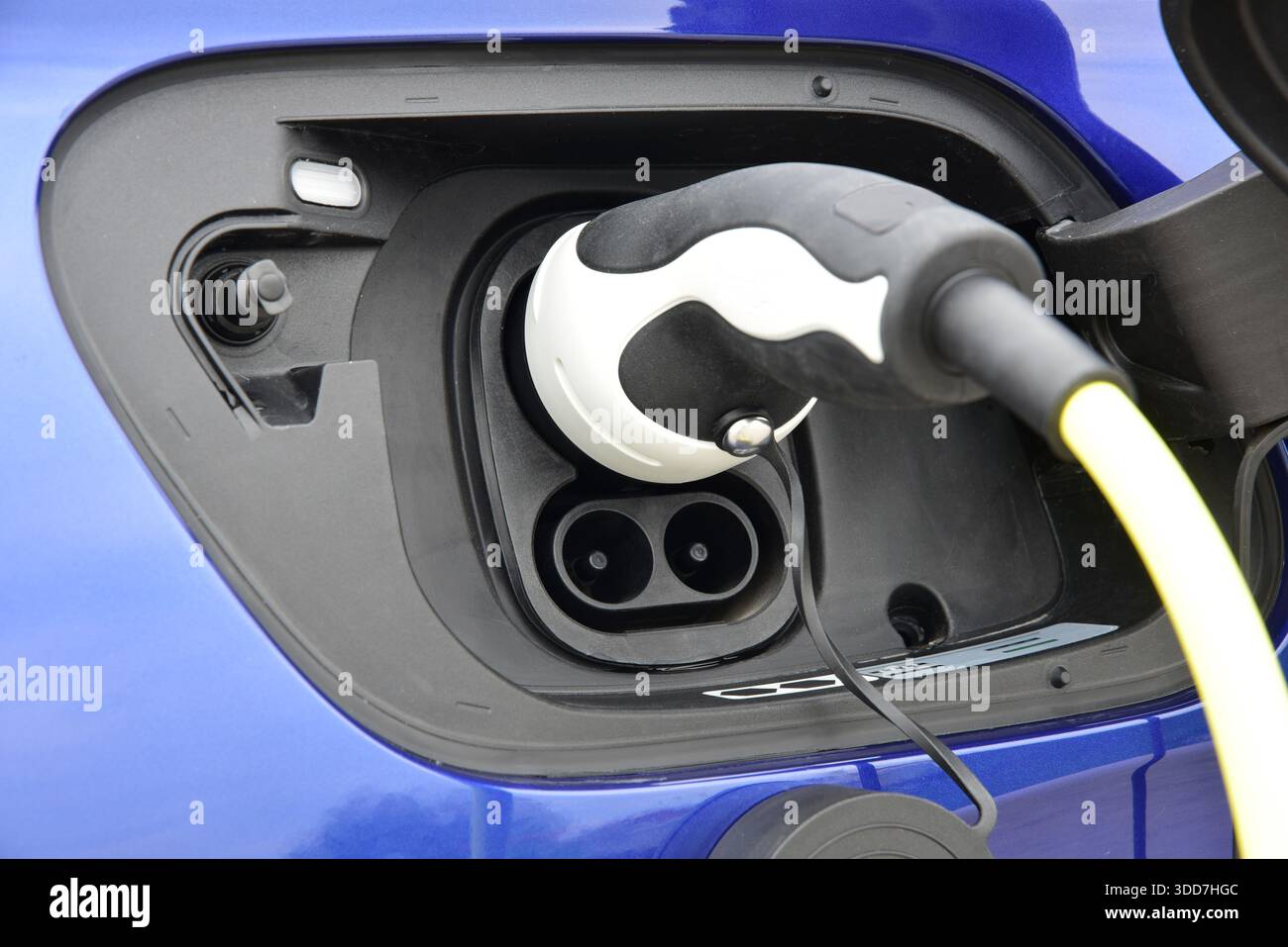 Connected charging connector to electric car. Loading energy of an ...