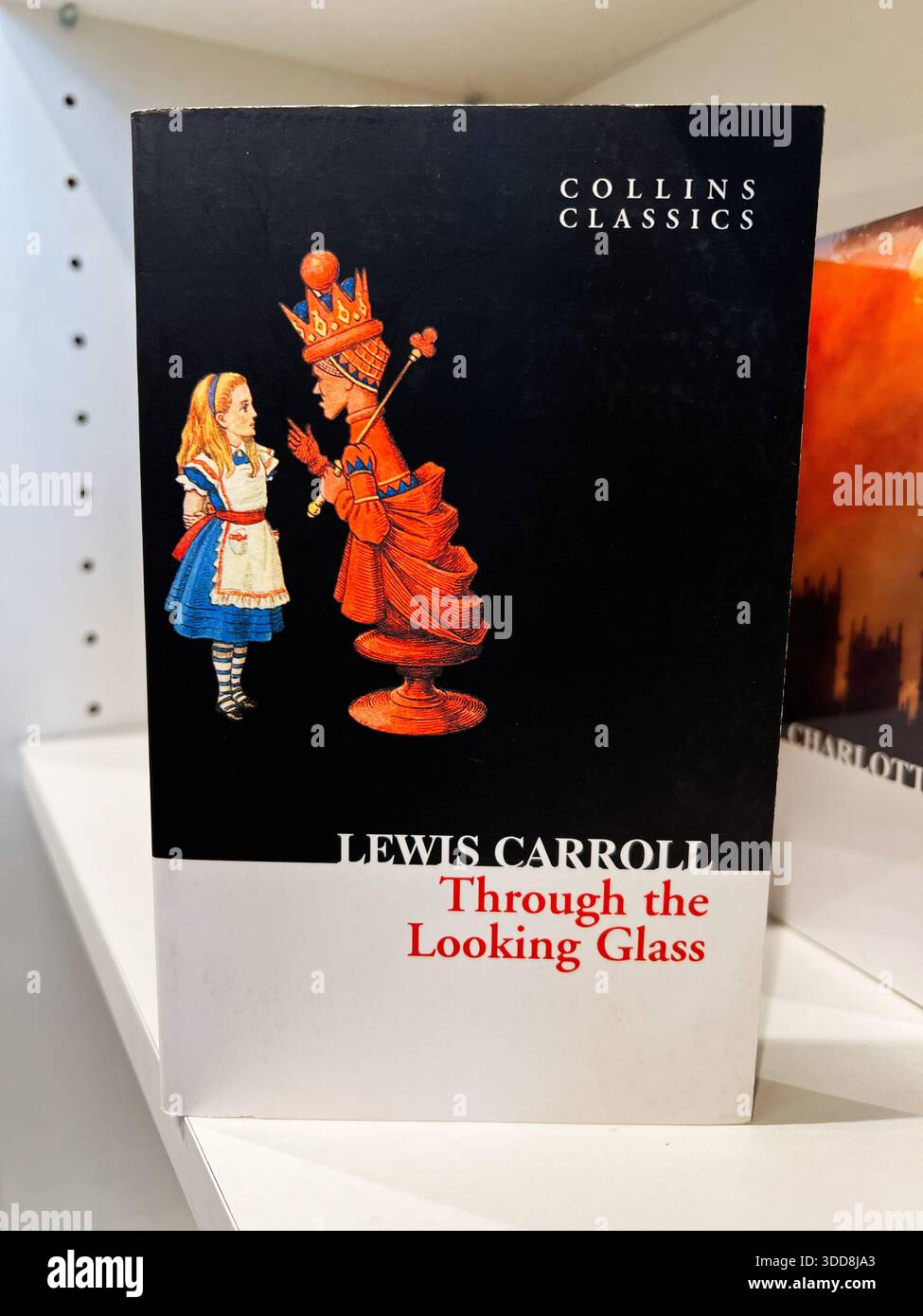 Girl reading alice in wonderland hi-res stock photography and images ...