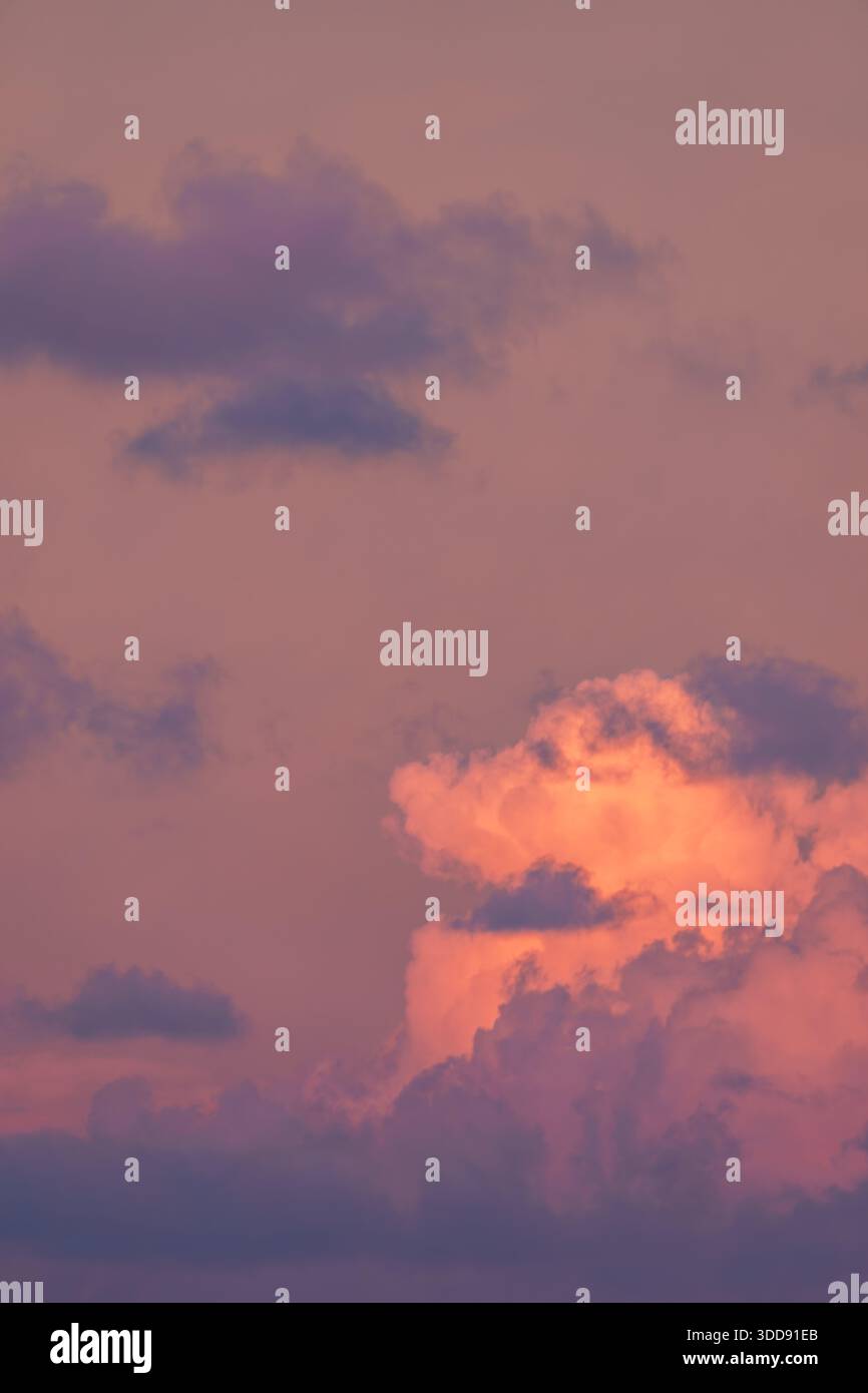 Dramatic red evening sky with low-level deep red stratocumulus cloud formation and sky. Stock Photo