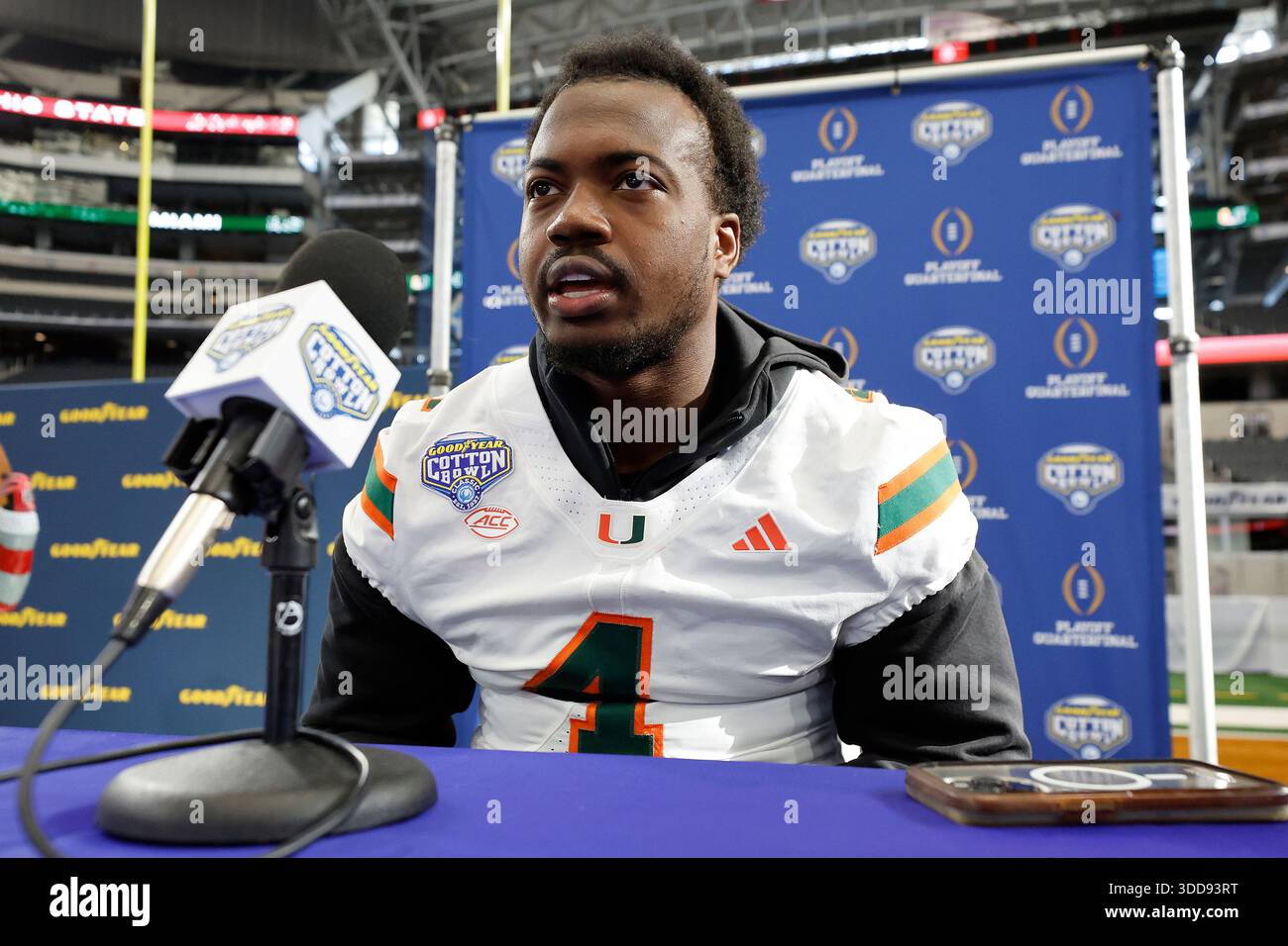 Miami defensive end Rueben Bain Jr. talks to reporters during media day ...
