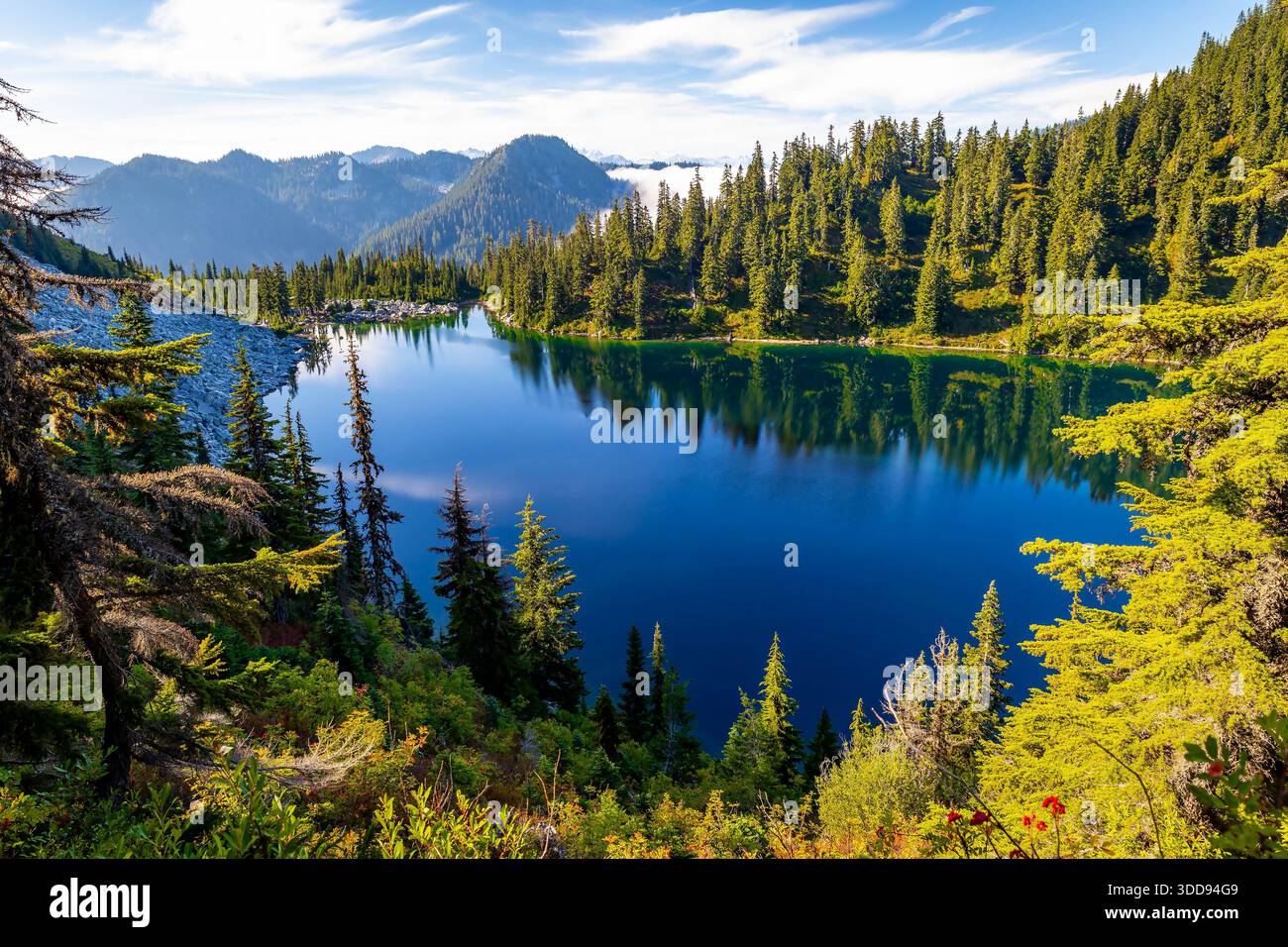 A breathtaking view of the vibrant blue waters of Lake Valhalla ...
