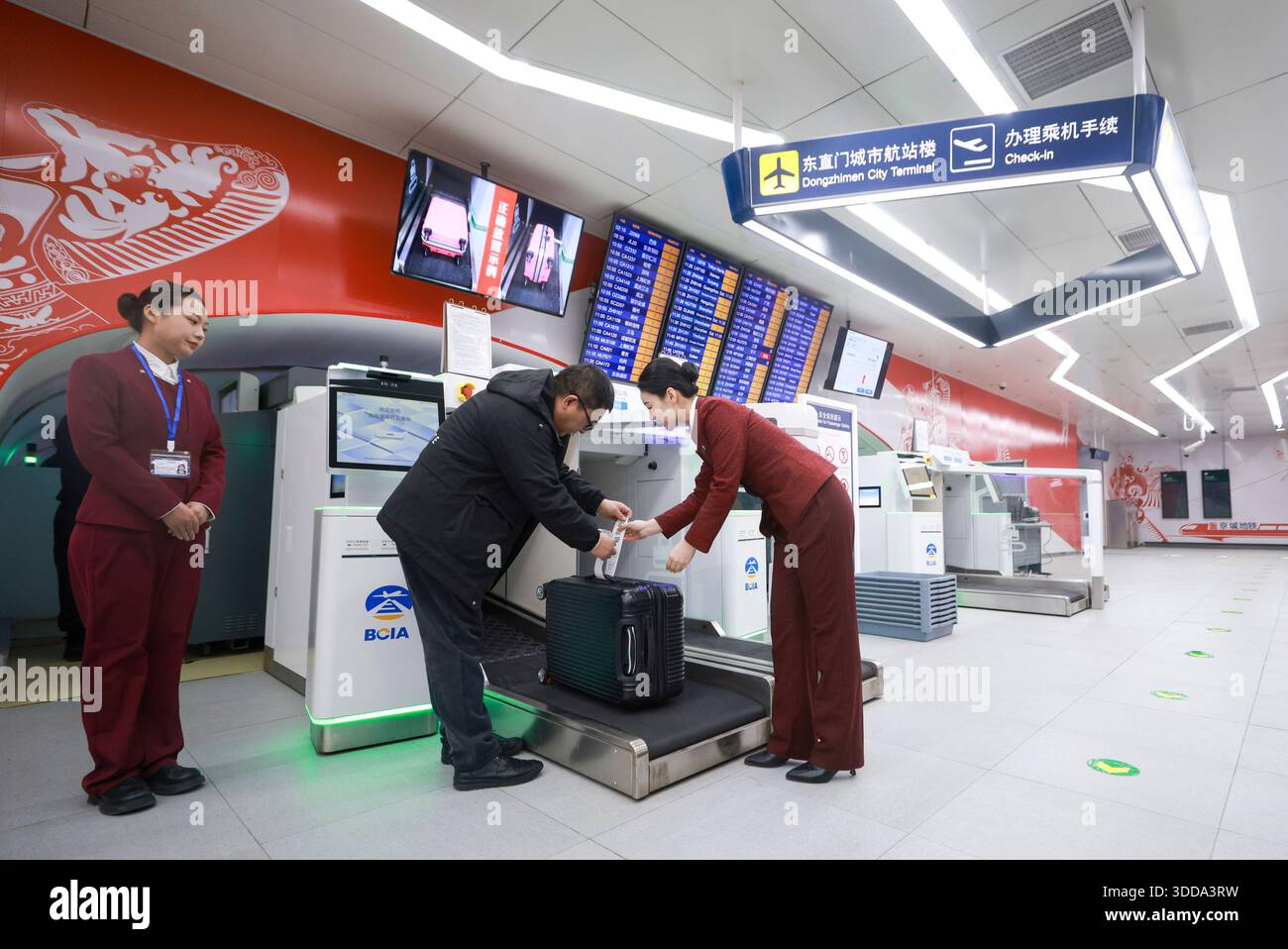 Beijing,China.29th December 2025. The luggage check-in service at ...