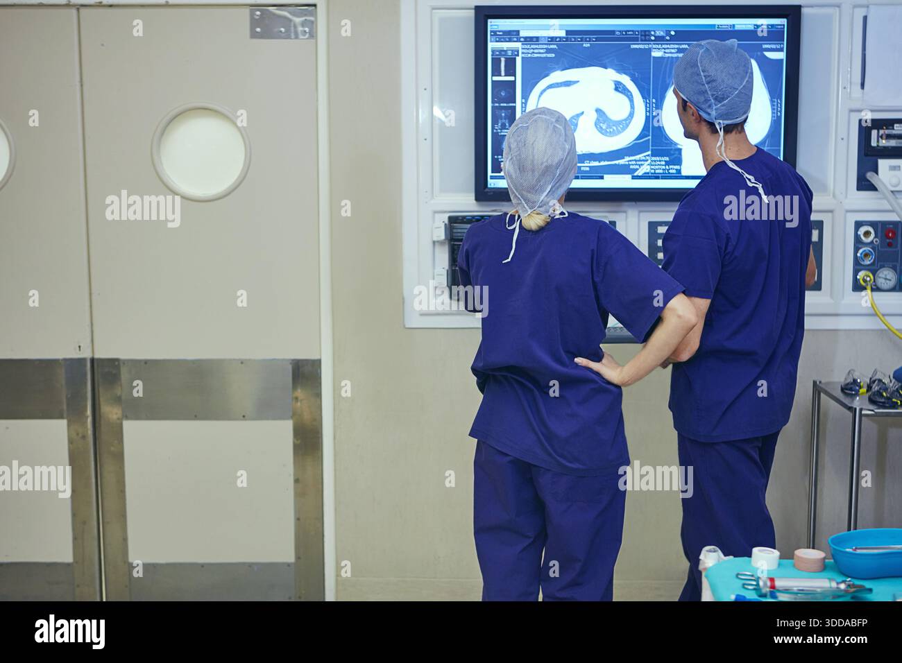Surgery, back and mri scan with people in theater of hospital for ...