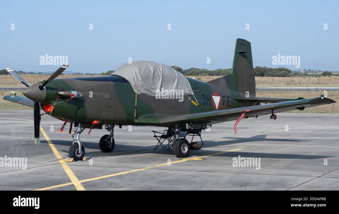 Beja, Portugal - 18 June 23: A small military aircraft parked on an  airfield, covered with a protective tarp. The plane is painted in  camouflage color Stock Photo - Alamy