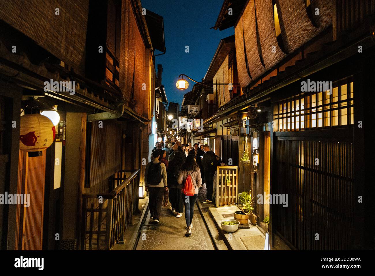 Atmospheric Pontocho Alley with shops and restaurants at night, Kyoto, Japan Stock Photo