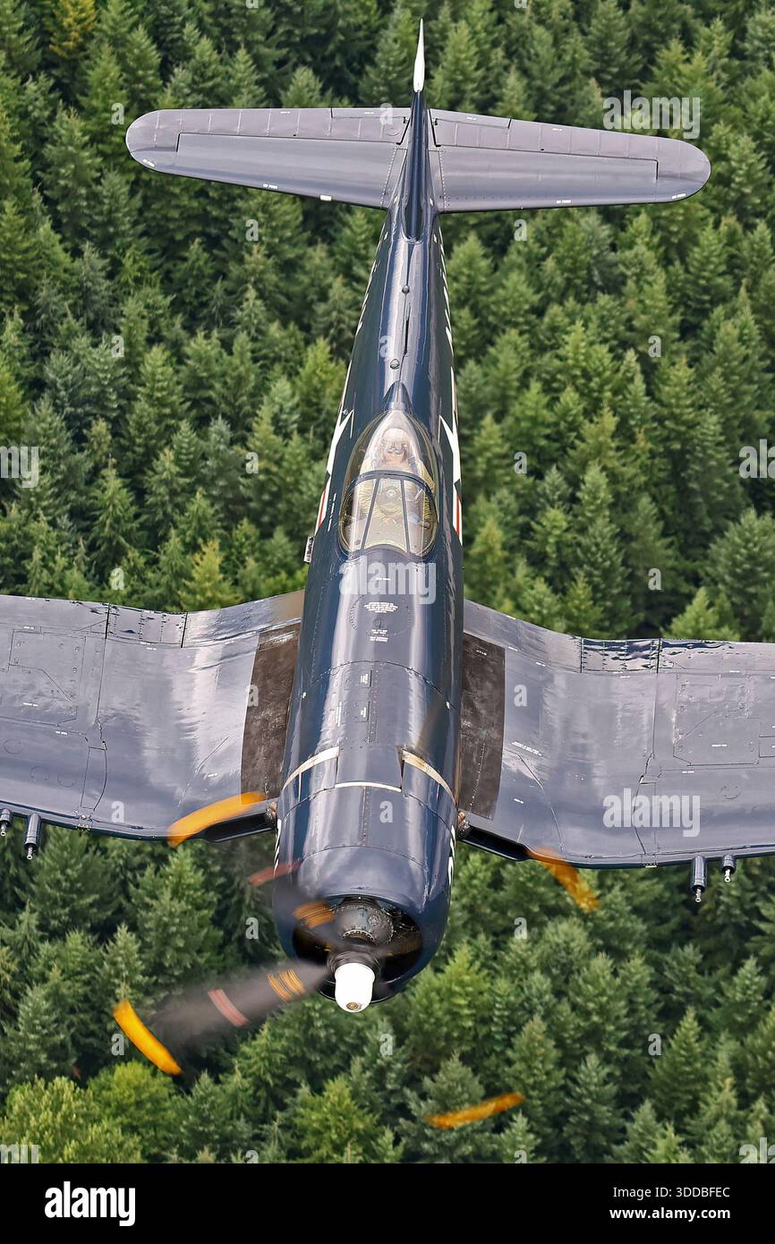 The Vought F4U-7 Corsair, NX1337A, serial 133732, is captured flying at ...
