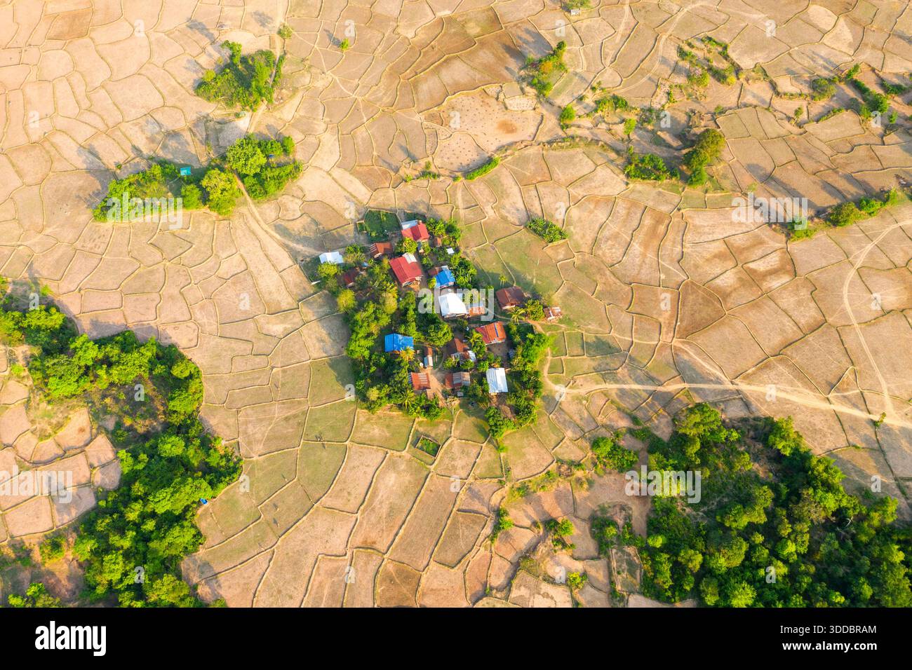 Aerial view of a small countryside village surrounded by a mosaic of ...