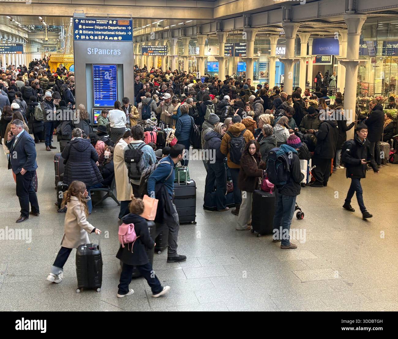 Delayed passengers at St Pancras train station, central London, after all Eurostar services were cancelled. Eurostar has asked customers not to travel today because of a problem with the overhead power supply in the Channel Tunnel and a failed Le Shuttle train. Picture date: Tuesday December 30, 2025. Stock Photo