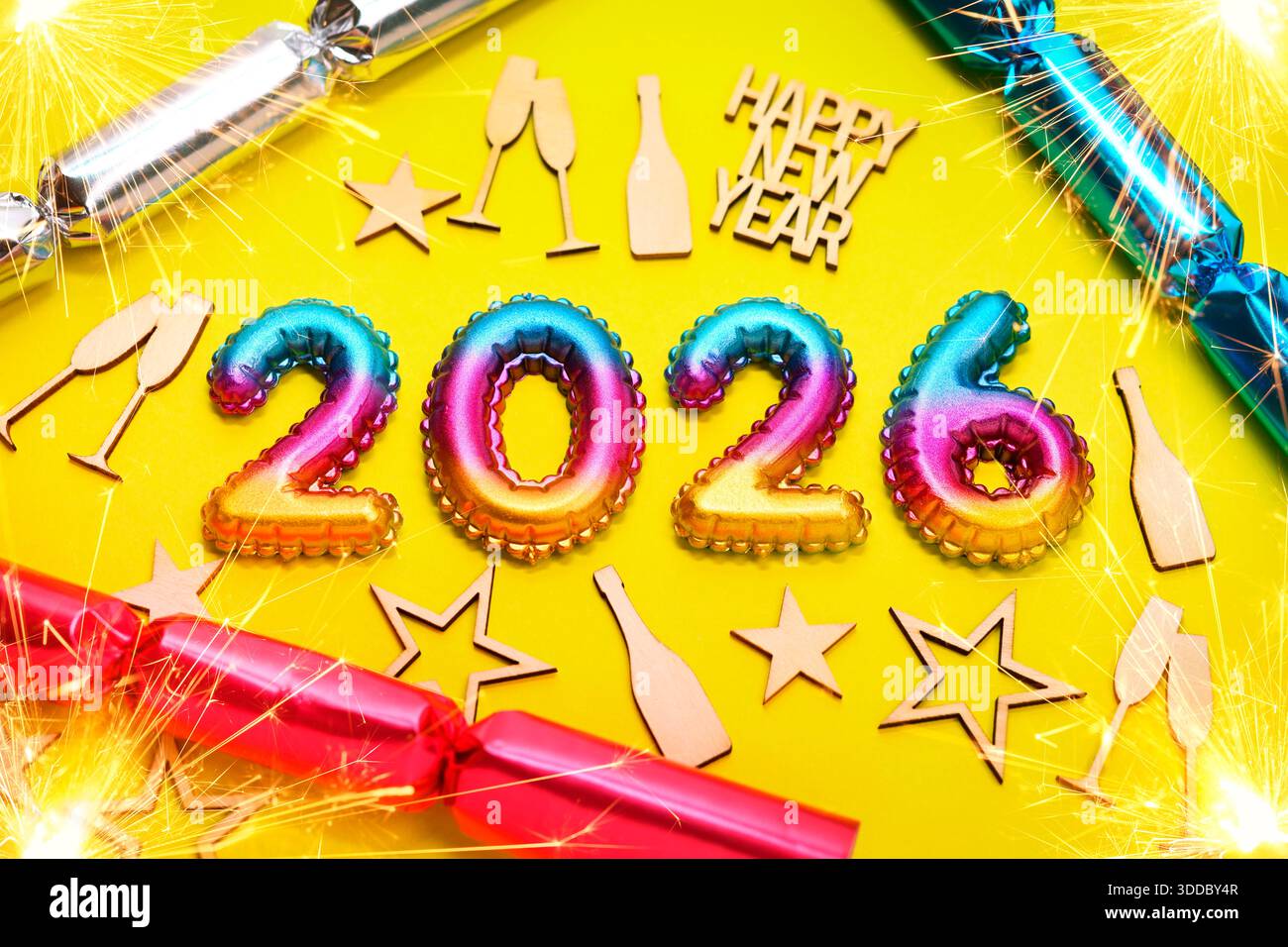 FOTOMONTAGE, Die Jahreszahl 2026 mit Knallbonbons, Wunderkerzen und Silvesterdeko, Symbolfoto Neujahr 2026 *** PHOTOMONTAGE, The year 2026 with firecrackers, sparklers and New Years Eve decorations, symbolic photo New Year 2026 Stock Photo