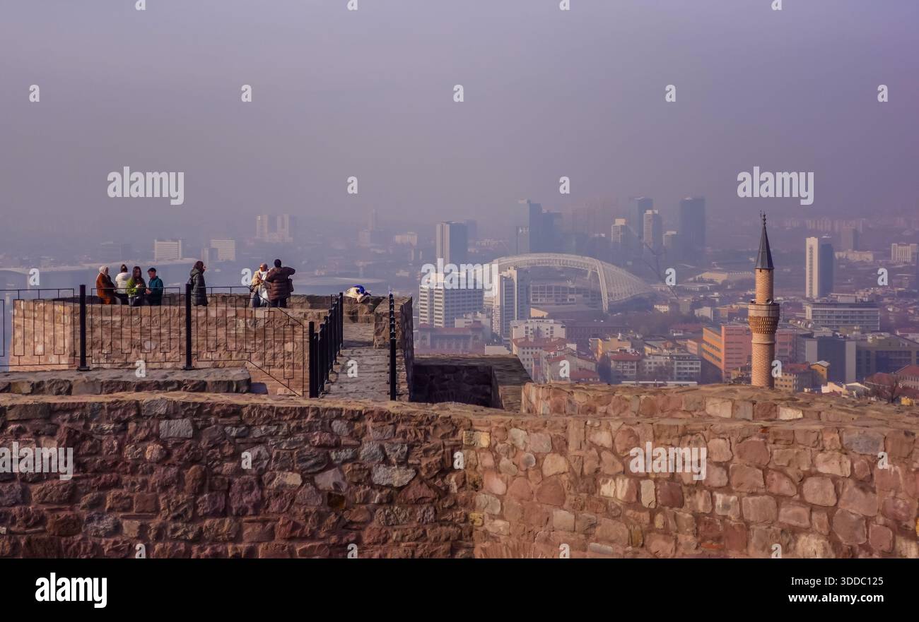 The cityscape of Ankara, Türkiye under smog seen from Ankara Castle - Stock Image