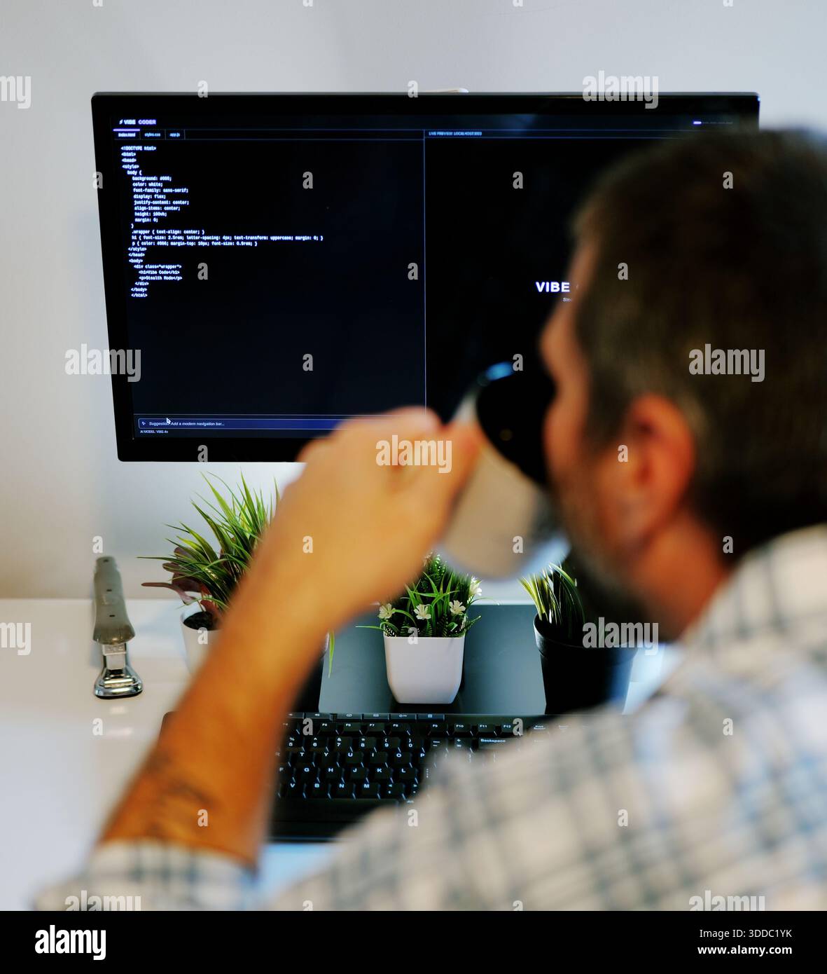 Middle Aged Software Engineer Vibe Codes Landing Page for Artificial Intelligence Based Integrated Development Environment Application Concept Stock Photo
