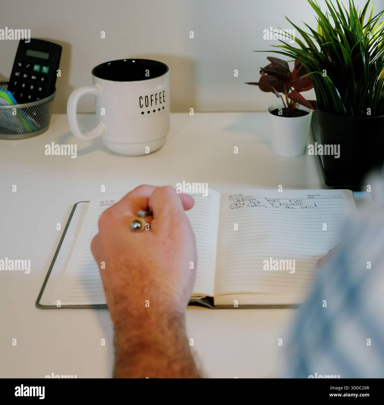 Middle Aged Software Engineer Vibe Codes Landing Page for Artificial Intelligence Based Integrated Development Environment Application Concept Stock Photo