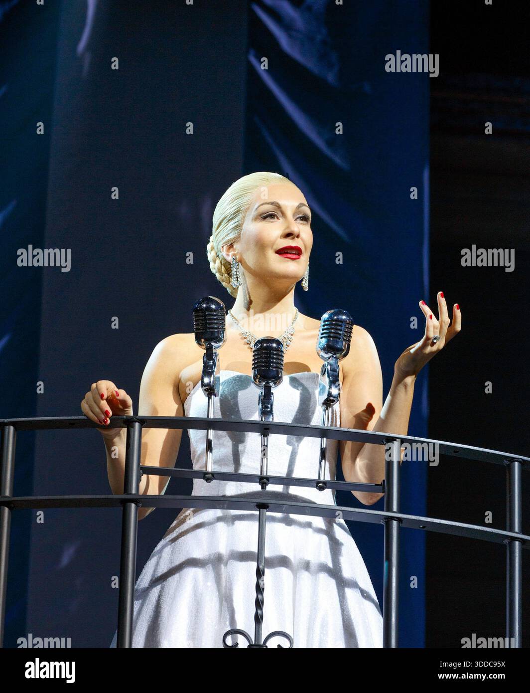 Don't Cry for Me Argentina': Madalena Alberto (Eva Peron) in EVITA at the  Dominion Theatre, London W1 22/09/2014 music: Andrew Lloyd Webber lyrics:  Tim Rice design: Matthew Wright lighting: Mark Howett choreographer: