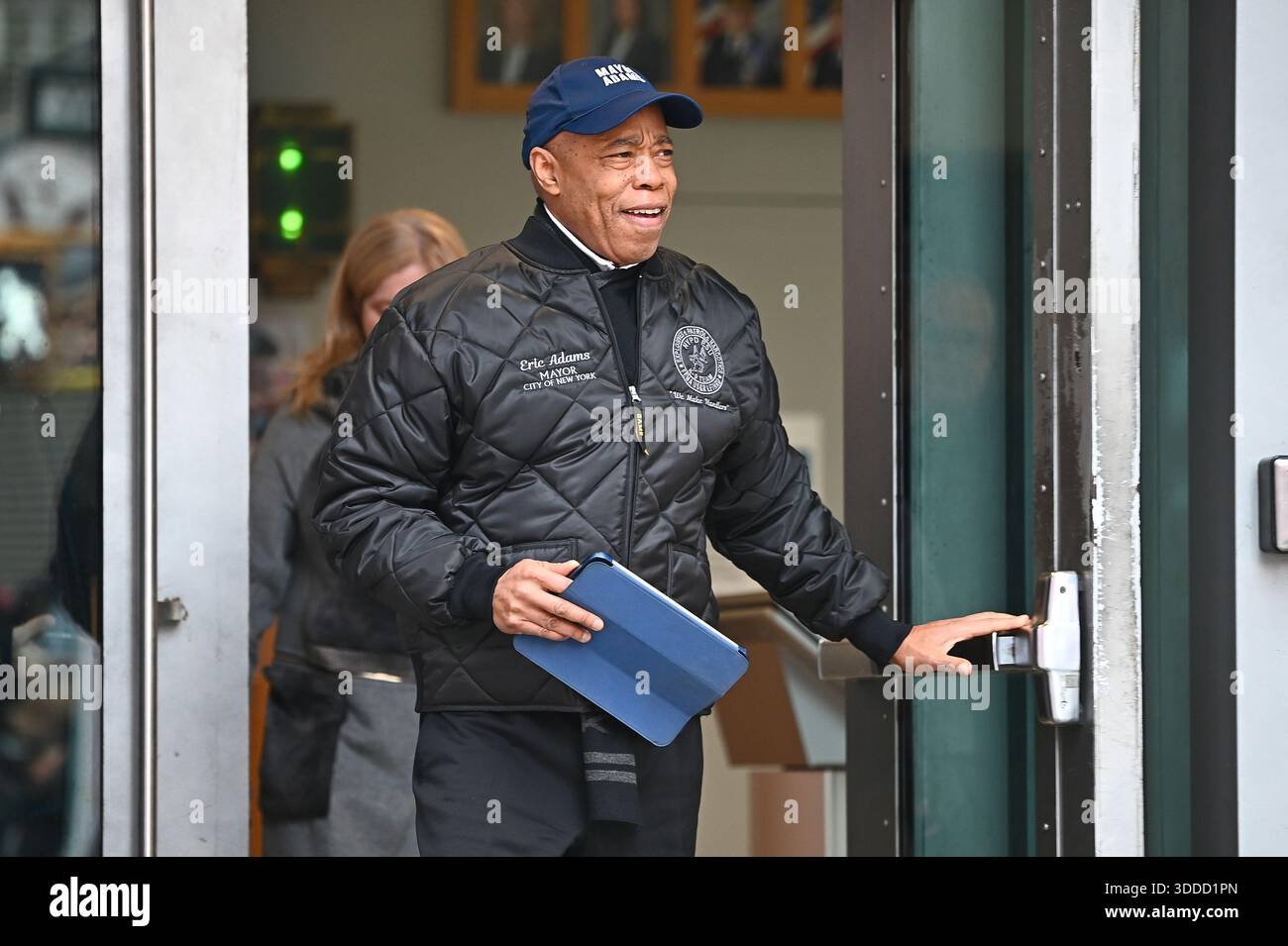 Outgoing New York City Mayor Eric Adams arrives at a press briefing ...