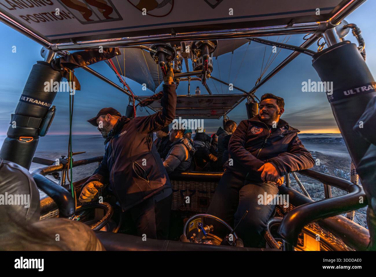 Passengers enjoy a balloon ride at sunrise in Göreme, Central Anatolia Region, Turkey Stock Photo