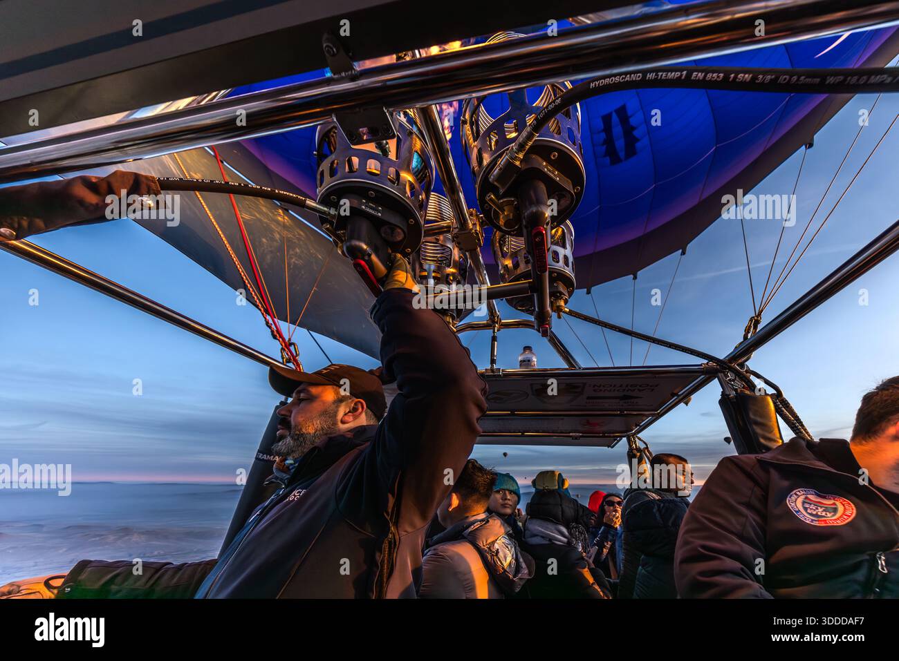Passengers enjoy a balloon ride at sunrise in Göreme, Central Anatolia Region, Turkey Stock Photo