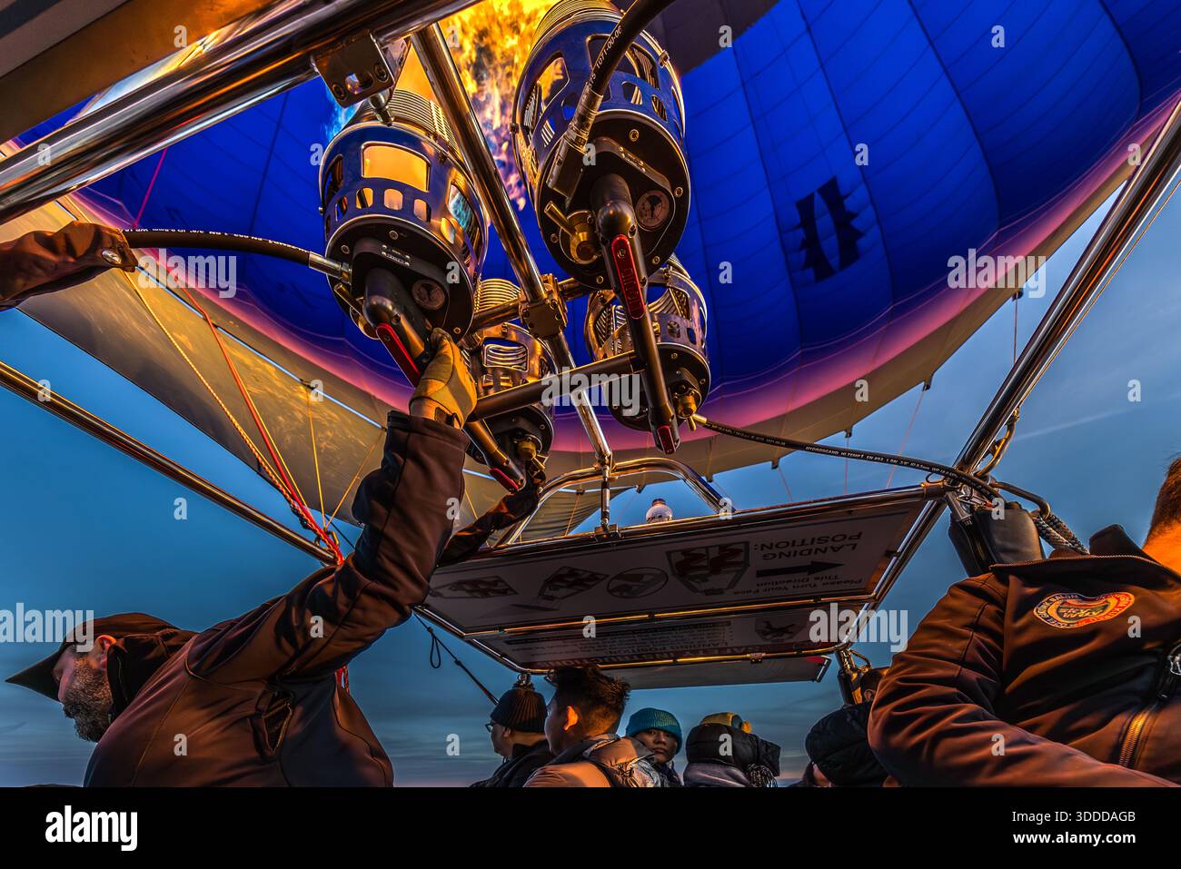 Passengers enjoy a balloon ride at sunrise in Göreme, Central Anatolia Region, Turkey Stock Photo