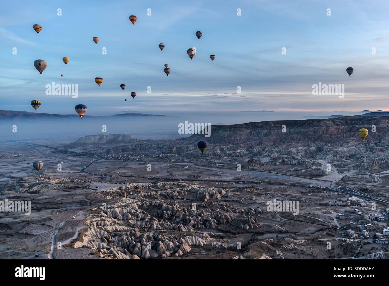 Hot air balloons float above the unique landscape of Göreme, Central Anatolia Region, Turkey Stock Photo