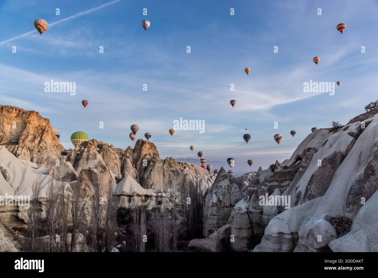 Hot air balloons float above the fairy chimneys of Cappadocia. Göreme, Central Anatolia Region, Turkey Stock Photo
