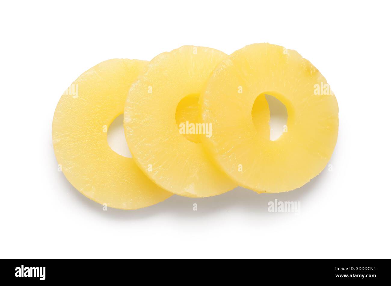 Canned pineapple rings on white background Stock Photo
