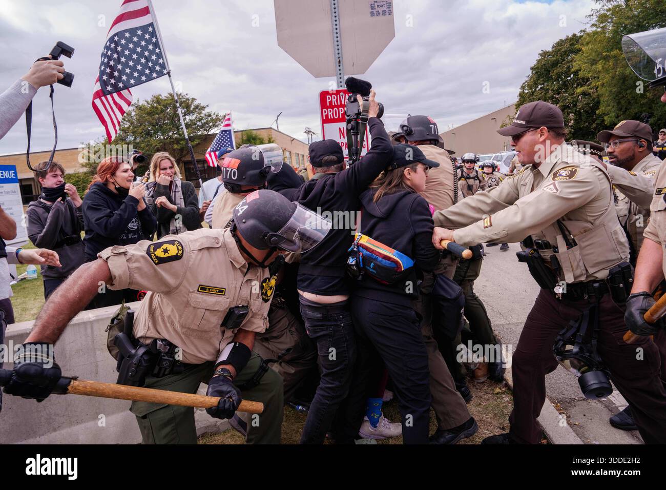 FILE - Illinois State Police and Cooks County Sheriffs move in to ...