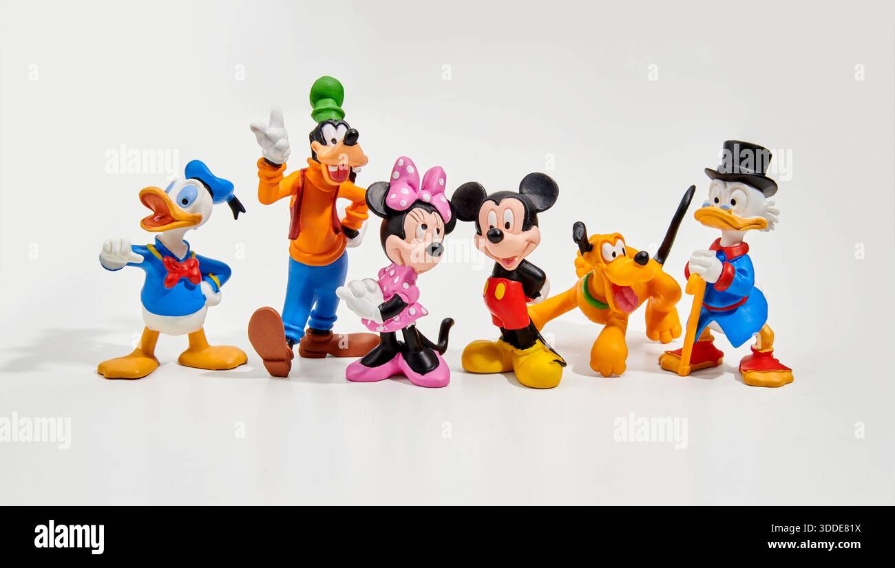 Set of colorful cute figurines of Walt Disney cartoon characters on white background Stock Photo