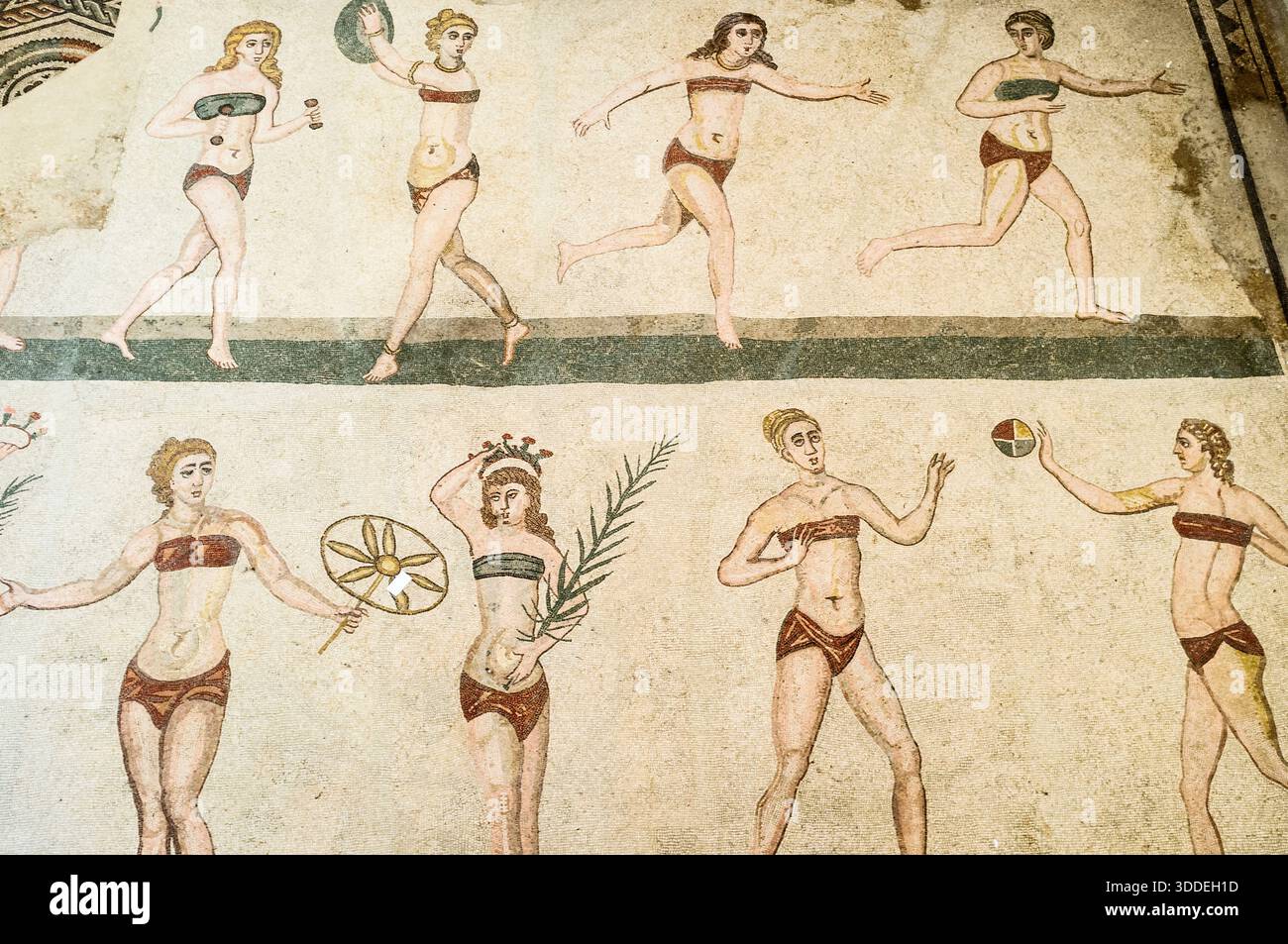 Female athletes competing in sport. Roman mosaics in Villa Romana del Casale, Piazza Armerina, Sicily. Stock Photo