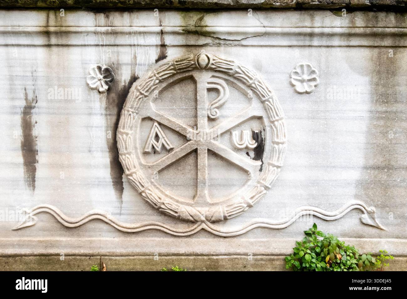 Chi Rho (or Chiro) monogram carved in marble on the side of a 3rd-4th ...