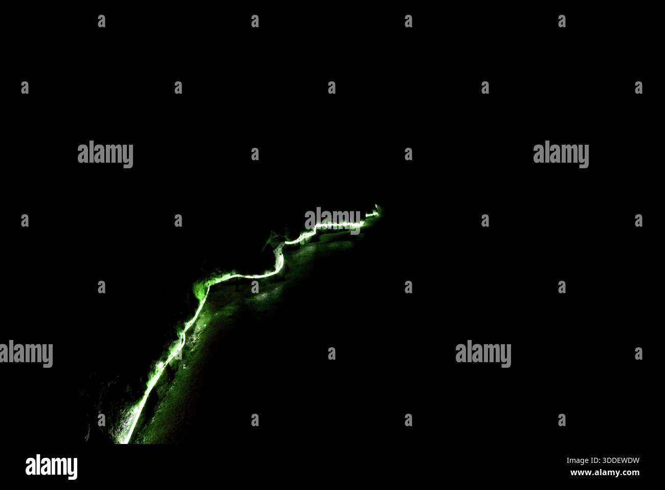 Green light in the dark Stock Photo
