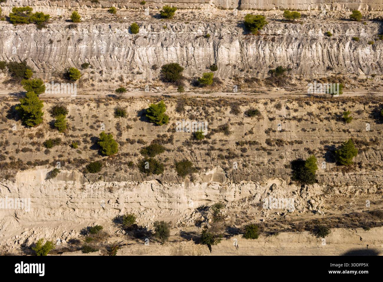 Aerial view of textured limestone cliffs along the Corinth Canal ...