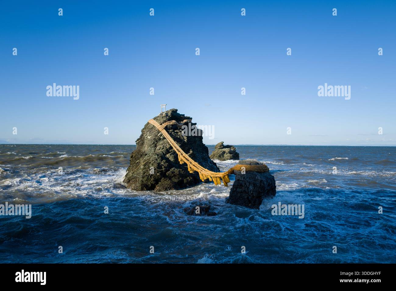 The iconic Meoto Iwa rocks, bound by a sacred straw shimenawa rope ...