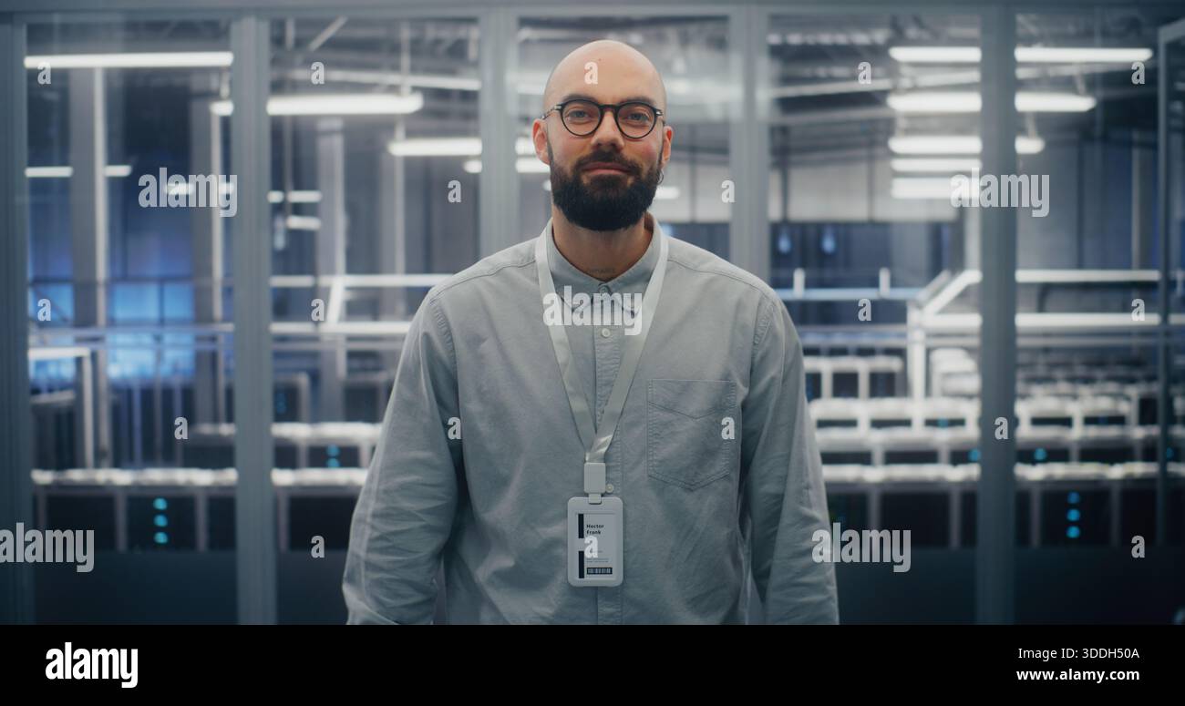 Technical Expert With Warm, Professional Expression in Blue Lit ...