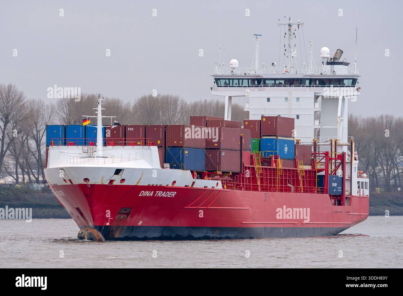 Feedervessel DINA TRADER shifting at the port of Hamburg Stock Photo