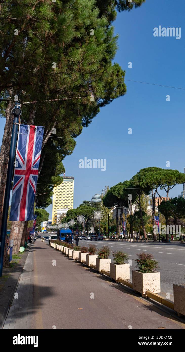 A 9:16 Portrait image of the Deshmoret e Kombit Boulevard leading to Skanderberg Square in Tirana, Albania - Stock Image