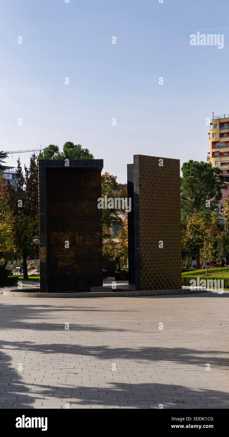 A 9:16 Portrait image of the Independence Memorial in Rinia Park, Tirana, Albania - Stock Image